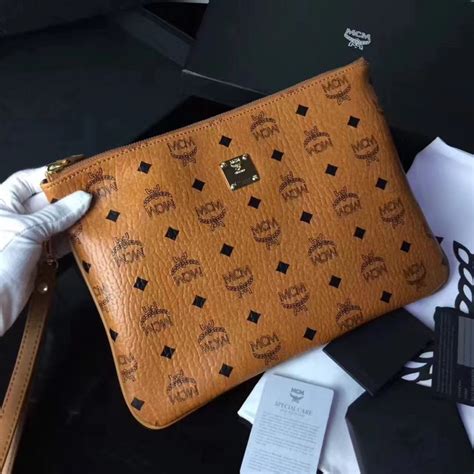 mcm wristlet fake